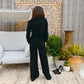 Vintage 70s Black Slinky Zip Up Bell Bottom Jumpsuit M